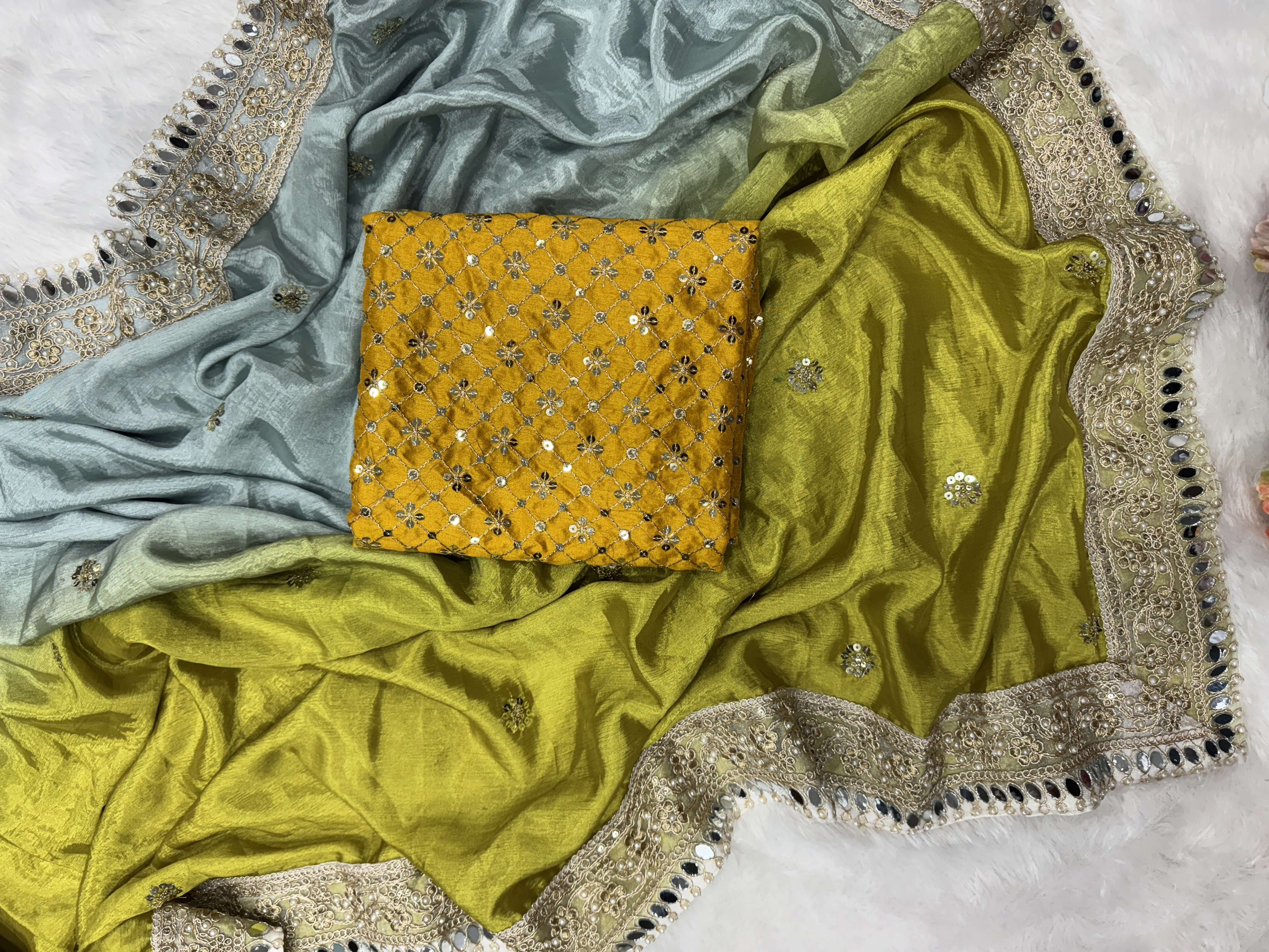 Shaded in beautiful color in soft chinnon fancy fabric saree wholesale in surat 5522